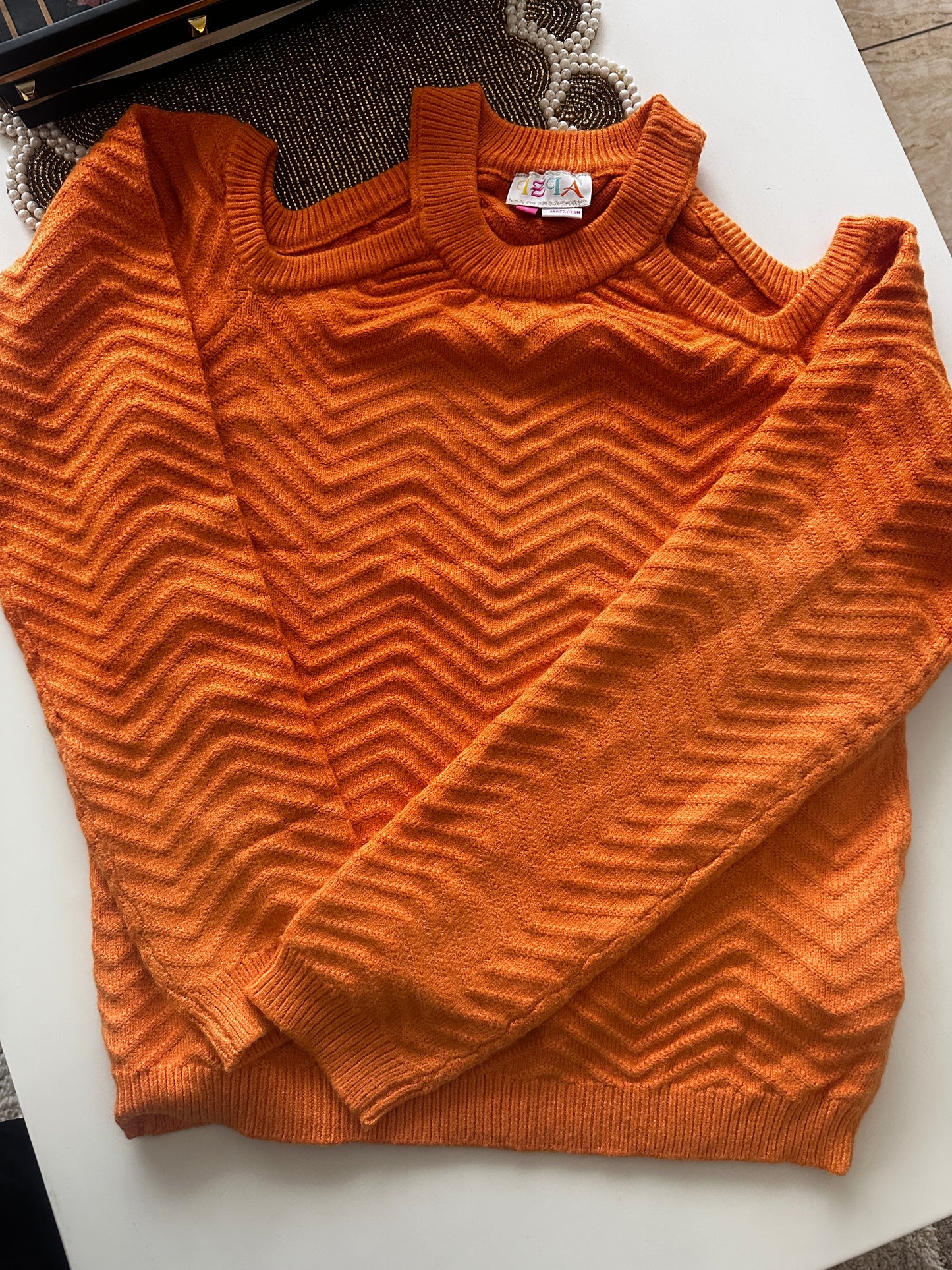 WOOLLEN CUT-SHOULDER SWEATER