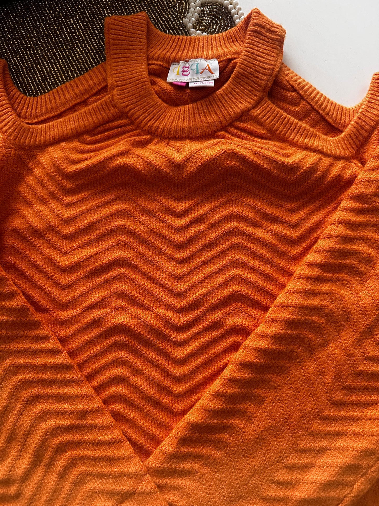 WOOLLEN CUT-SHOULDER SWEATER